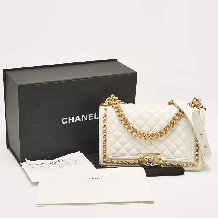 Pre Owned Chanel Off White Quilted Caviar Leather Medium Chain Around Boy Flap Bag