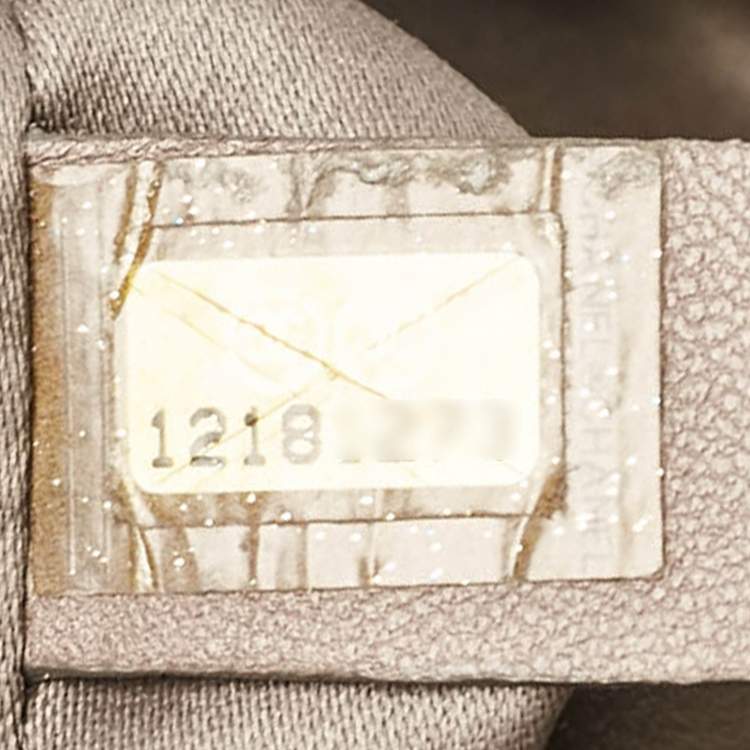 Pre Owned Chanel Metallic Grey Leather Perforated Rodeo Drive Hobo