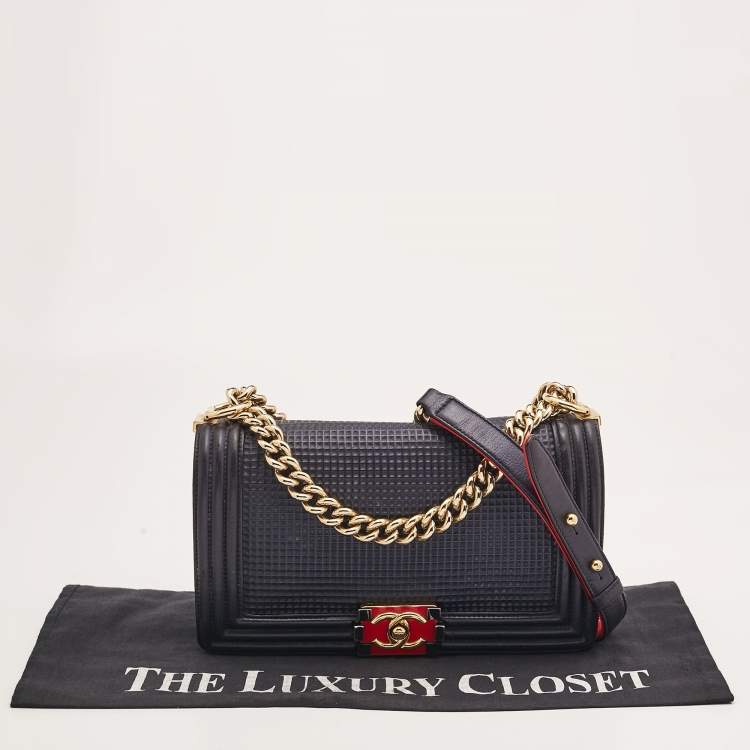 Pre Owned Chanel Navy Blue Cube Embossed Leather Medium Boy Flap Bag