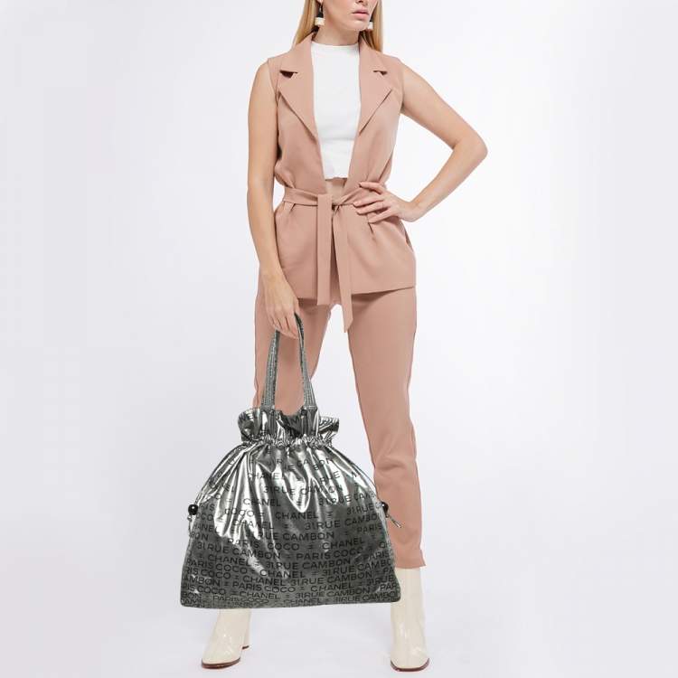 Pre Owned Chanel Silver Coated Nylon 31 Rue Cambon Graphic Drawstring Tote