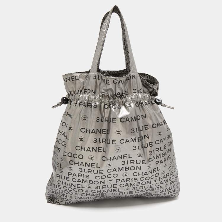 Pre Owned Chanel Silver Coated Nylon 31 Rue Cambon Graphic Drawstring Tote