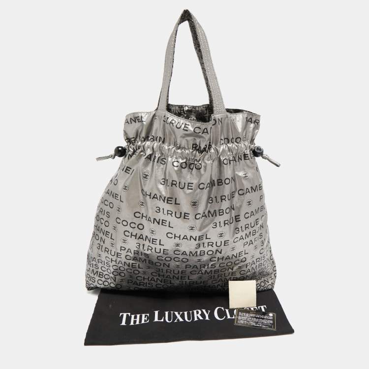 Pre Owned Chanel Silver Coated Nylon 31 Rue Cambon Graphic Drawstring Tote