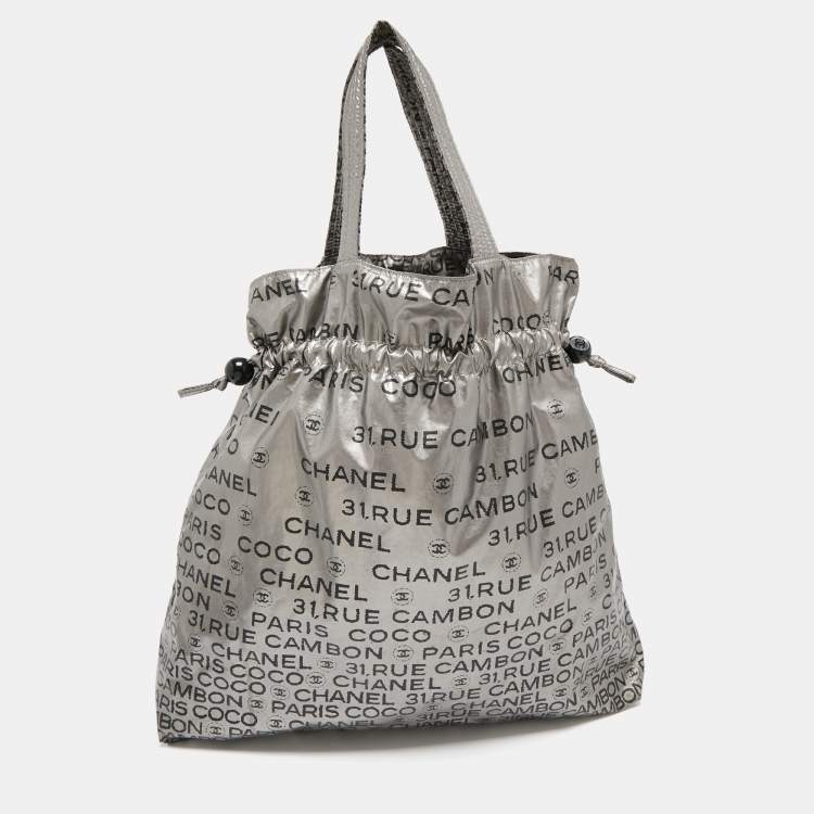 Pre Owned Chanel Silver Coated Nylon 31 Rue Cambon Graphic Drawstring Tote