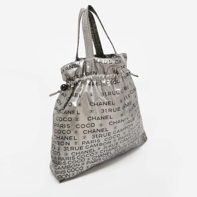 Pre Owned Chanel Silver Coated Nylon 31 Rue Cambon Graphic Drawstring Tote