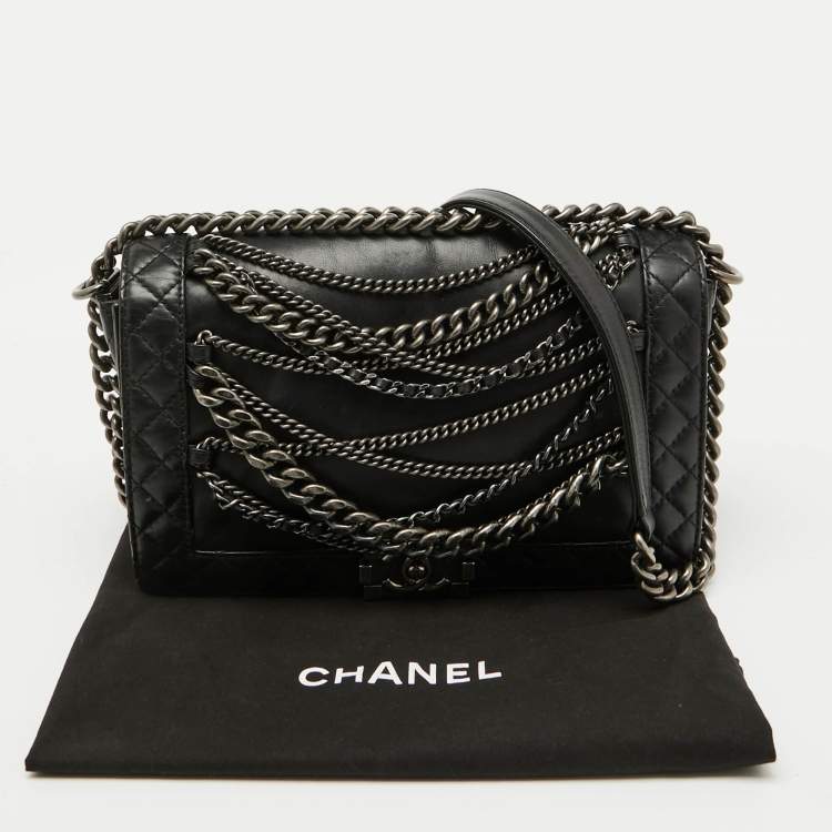 Pre Owned Chanel Black Leather Enchained New Medium Boy Flap Bag