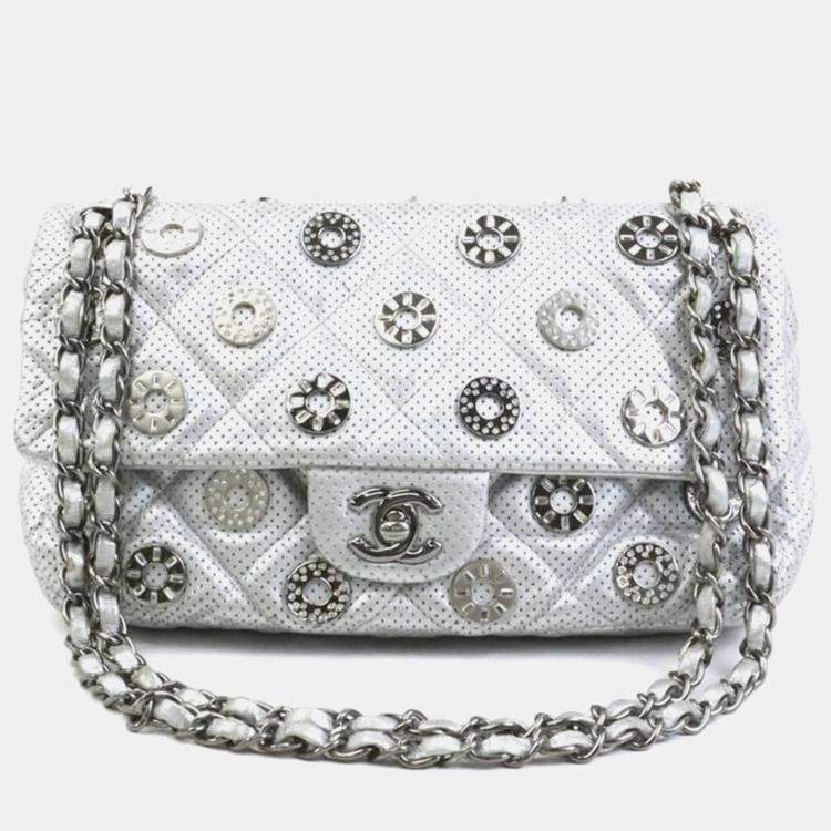 Pre Owned Chanel Silver Leather and Metal Rhinestone Paris-Dubai Perforated Eyelet Shoulder Bag
