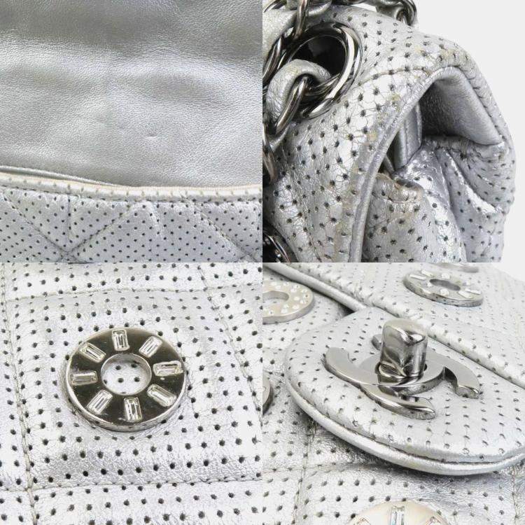 Pre Owned Chanel Silver Leather and Metal Rhinestone Paris-Dubai Perforated Eyelet Shoulder Bag