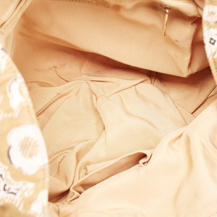 Pre Owned Chanel Beige Camellia Print Canvas CC Metal Handle Hobo