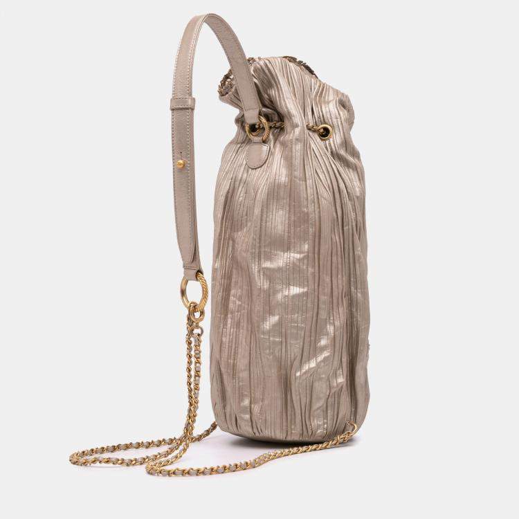 Pre Owned Chanel Medium Metallic Calfskin Coco Pleats Drawstring Backpack