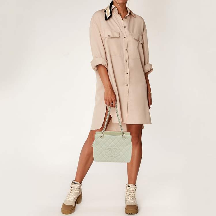 Pre Owned Chanel Off White Quilted Caviar Leather Petite Timeless Shopper Tote Bag