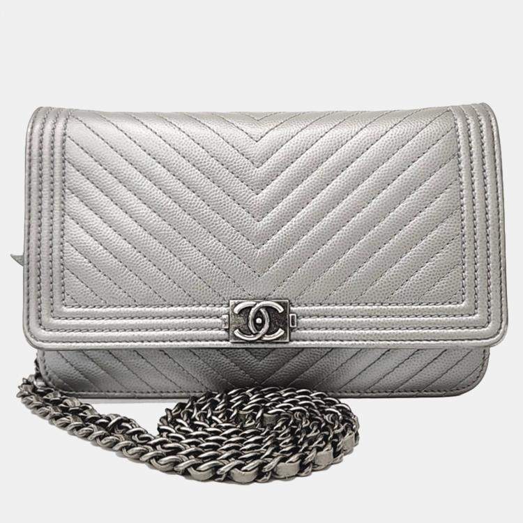 Pre Owned Chanel Silver Leather Caviar Chevron WOC Mini Crossbody Bag