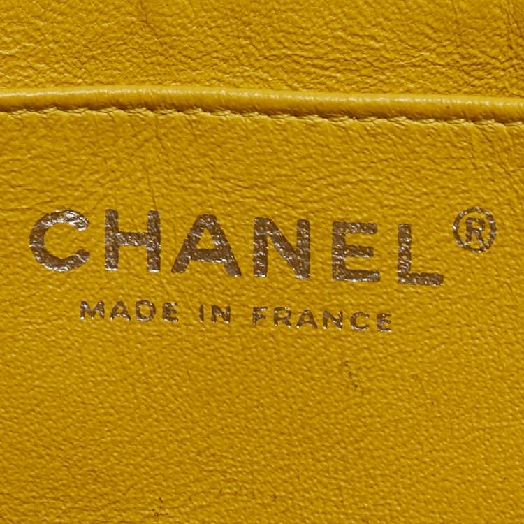Pre Owned Chanel Yellow Quilted Caviar Leather Maxi Classic Single Flap Bag