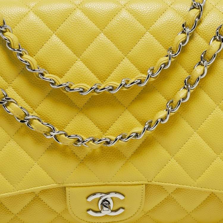 Pre Owned Chanel Yellow Quilted Caviar Leather Maxi Classic Single Flap Bag