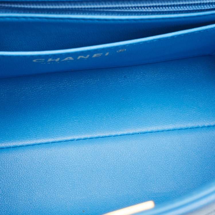 Pre Owned Chanel Blue Quilted Caviar Leather Mini Retro Twist Top Handle Bag