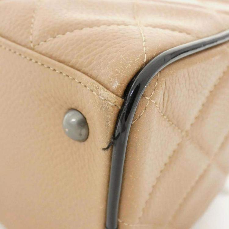Pre Owned Chanel Beige Enamel Leather Boston Bag