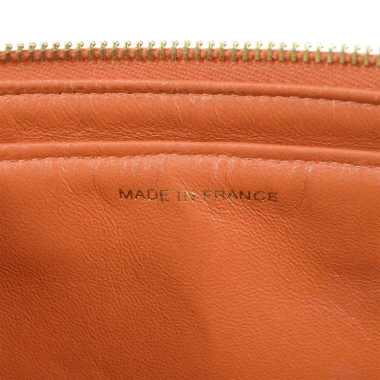 Pre Owned Chanel Orange Lambskin Classic Flap Chain Backpack