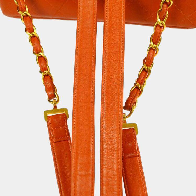 Pre Owned Chanel Orange Lambskin Classic Flap Chain Backpack