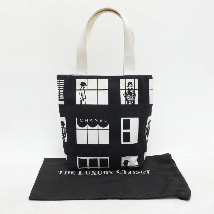 Pre Owned Chanel Navy Blue/White Canvas Coco Window Tote