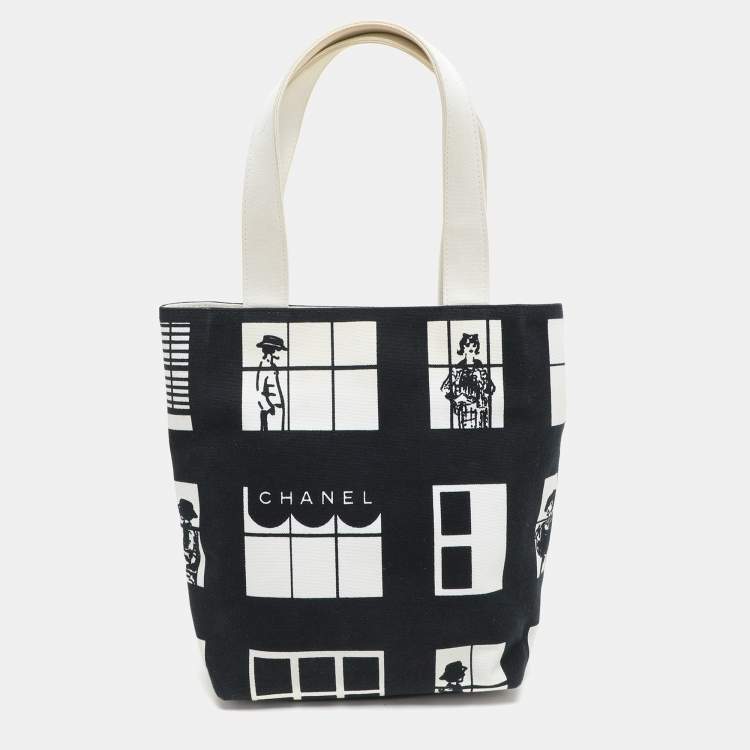 Pre Owned Chanel Navy Blue/White Canvas Coco Window Tote