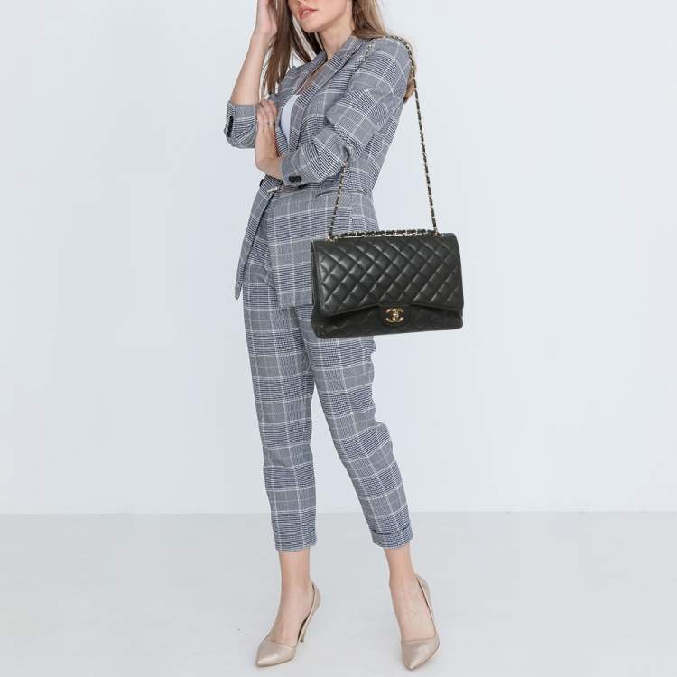 Pre Owned Chanel Black Quilted Caviar Leather Maxi Classic Double Flap Bag