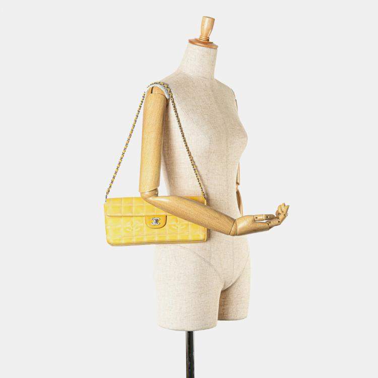 Pre Owned Chanel Yellow New Travel Line Nylon East West Flap