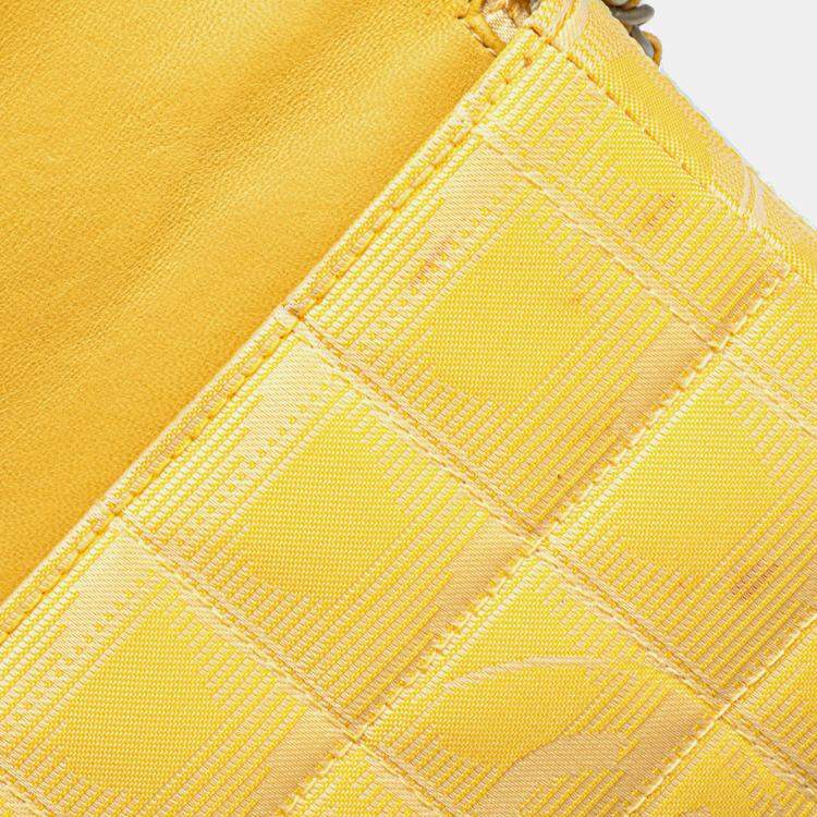 Pre Owned Chanel Yellow New Travel Line Nylon East West Flap