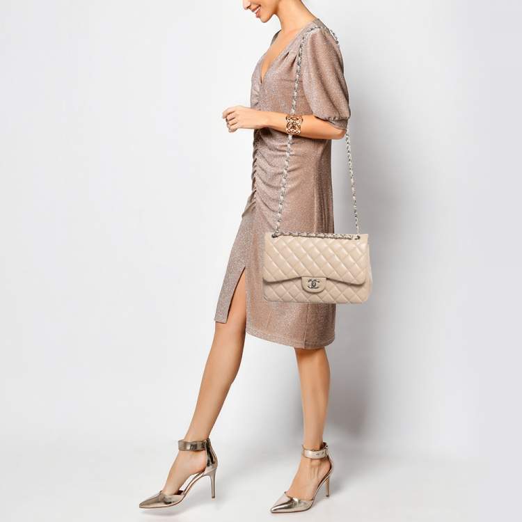 Pre Owned Chanel Light Beige Quilted Caviar Leather Jumbo Classic Double Flap Bag