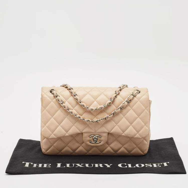 Pre Owned Chanel Light Beige Quilted Caviar Leather Jumbo Classic Double Flap Bag