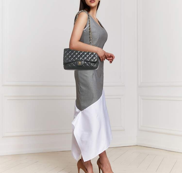 Pre Owned Chanel Black Quilted Caviar Leather Jumbo Classic Single Flap Bag