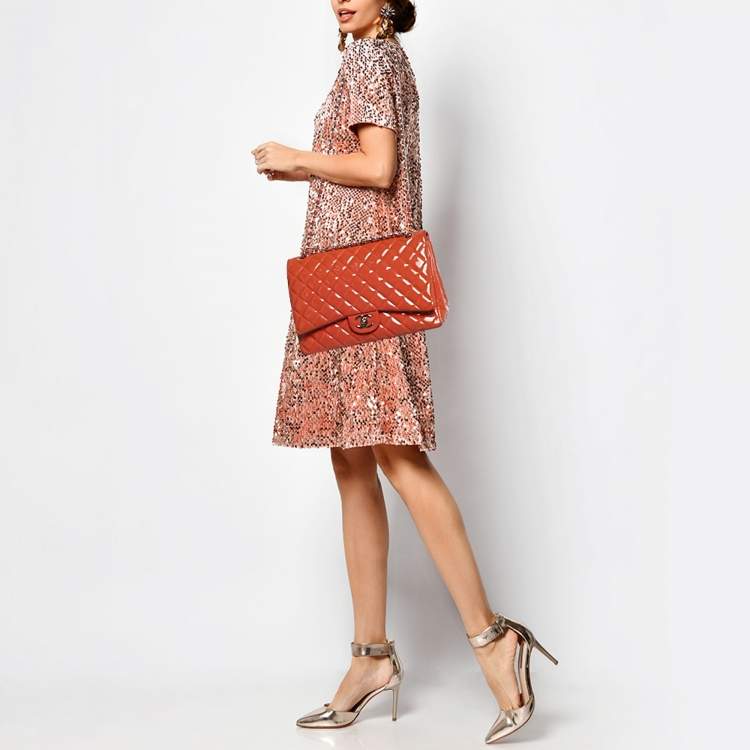 Pre Owned Chanel Orange Patent Leather Maxi Classic Double Flap Bag