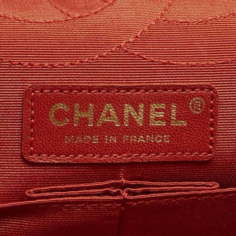Pre Owned Chanel Orange Quilted Jersey Classic 225 Reissue 2.55 Flap Bag