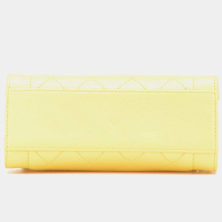 Pre Owned Chanel Yellow Mini Calfskin Label Click Shopping Tote
