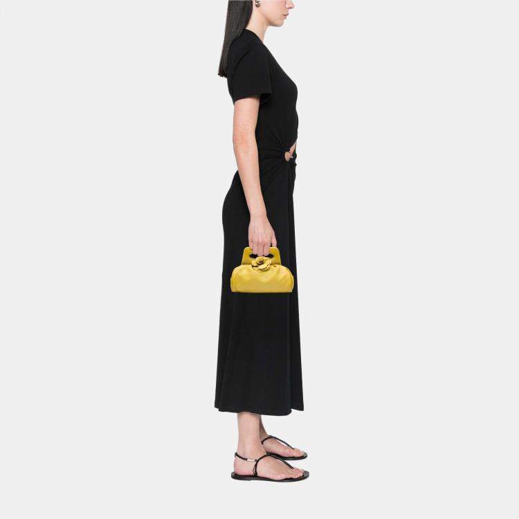 Pre Owned Chanel Yellow Lambskin Camellia Frame Clutch