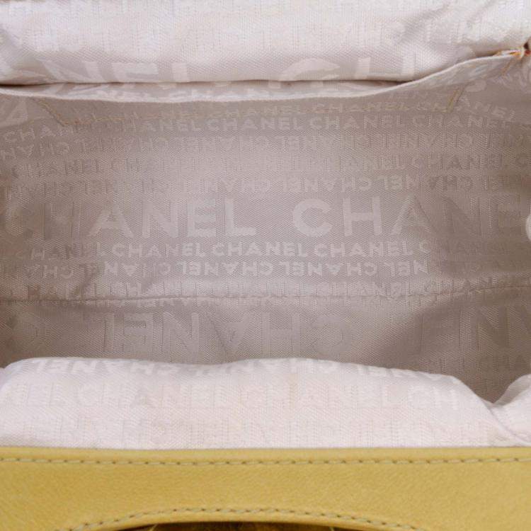 Pre Owned Chanel Yellow Lambskin Camellia Frame Clutch