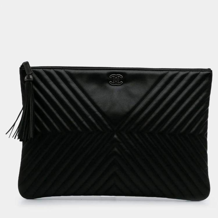Pre Owned Chanel Diagonal Chevron Large Black Calfskin Tassel O Case Clutch