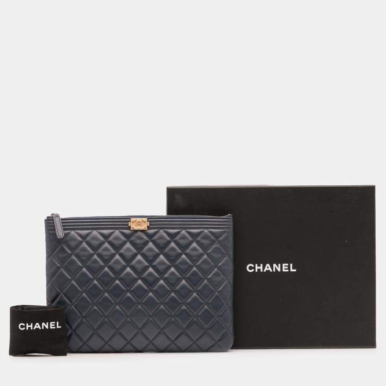 Pre Owned Chanel Navy Blue Medium Quilted Lambskin Boy O Case Clutch