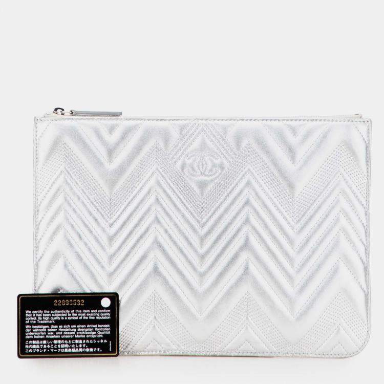 Pre Owned Chanel Silver Medium Metallic Chevron Calfskin O Case Clutch