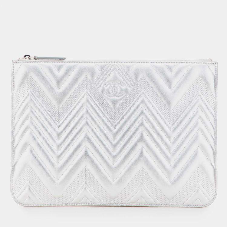Pre Owned Chanel Silver Medium Metallic Chevron Calfskin O Case Clutch