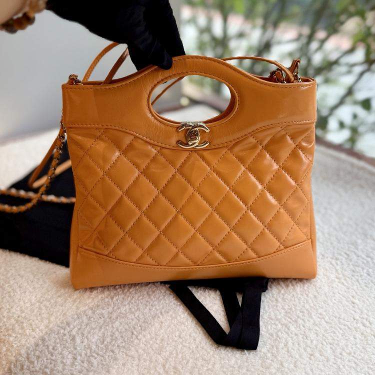 Pre Owned Chanel 31 Orange Quilted Leather Handbag