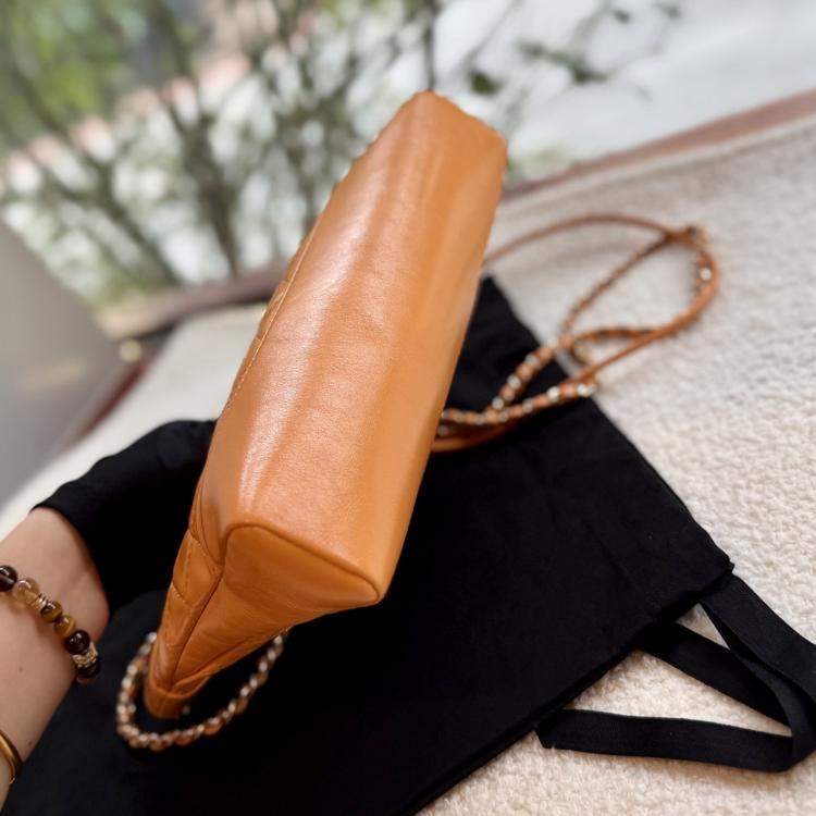 Pre Owned Chanel 31 Orange Quilted Leather Handbag