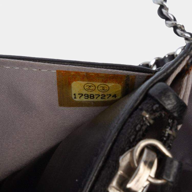 Pre Owned Chanel Black Camellia Embossed Lambskin Wallet On Chain
