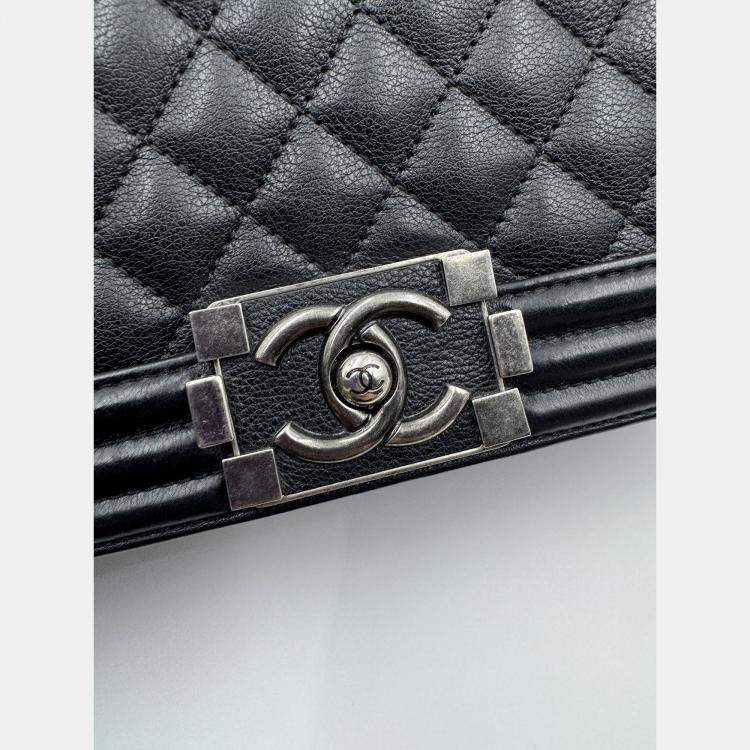 Pre Owned Chanel black Quilted Caviar Leather Medium Boy Bag