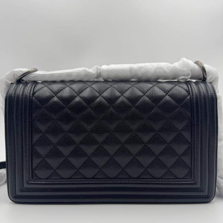 Pre Owned Chanel black Quilted Caviar Leather Medium Boy Bag