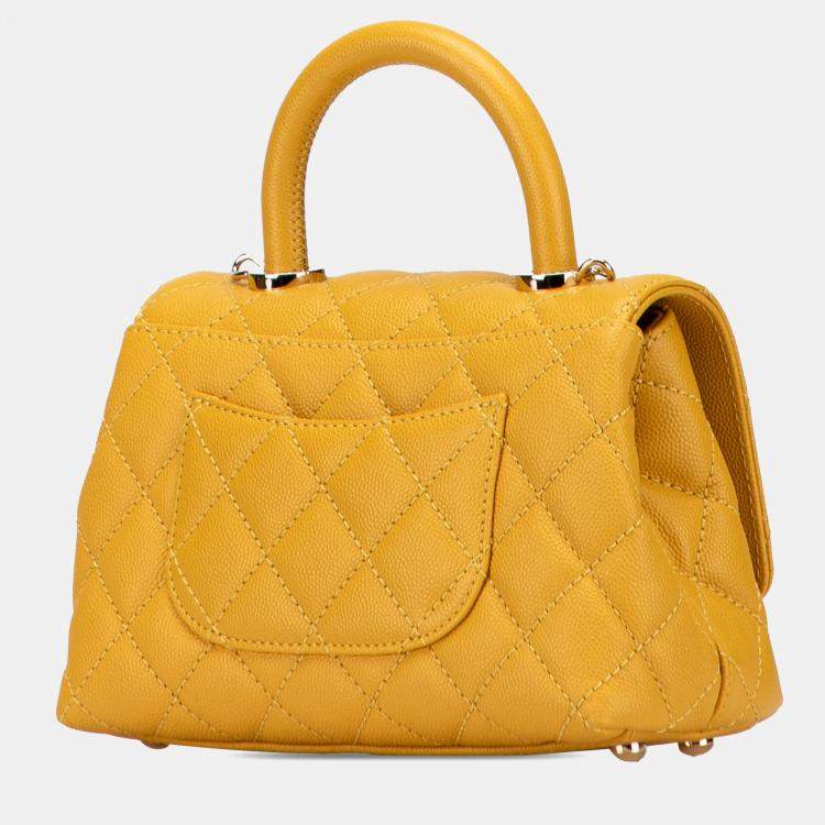 Pre Owned Chanel Yellow Extra Mini Quilted Caviar Coco Top Handle Bag