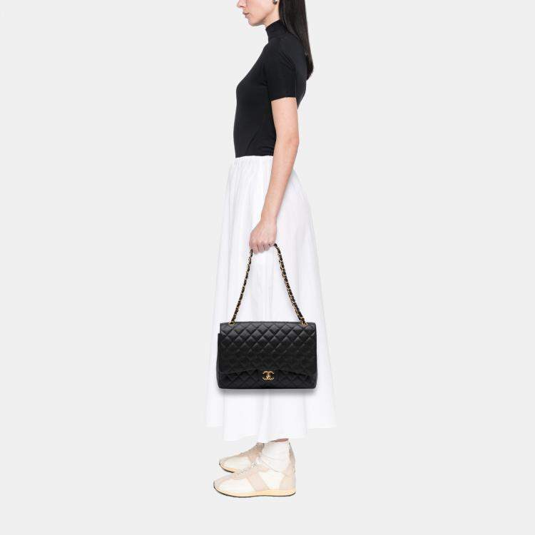 Pre Owned Chanel Black Maxi Classic Caviar Double Flap