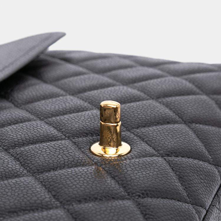 Pre Owned Chanel Black Maxi Classic Caviar Double Flap