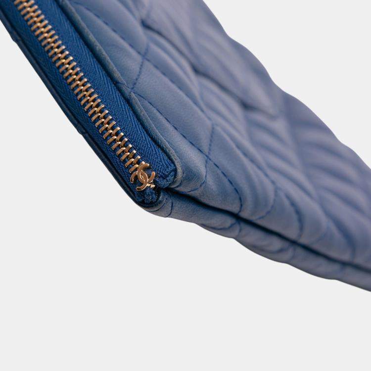 Pre Owned Chanel Blue Large Quilted Lambskin O Case Clutch