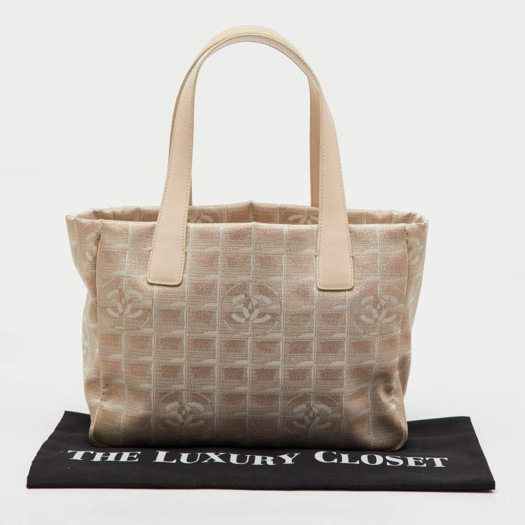 Pre Owned Chanel Beige Shimmer Nylon and Leather CC Logo Travel Line Tote