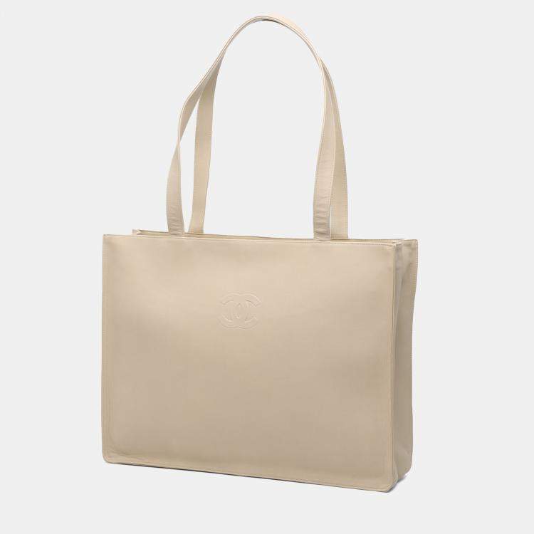 Pre Owned Chanel Brown Lambskin Embossed CC Camellia Tote