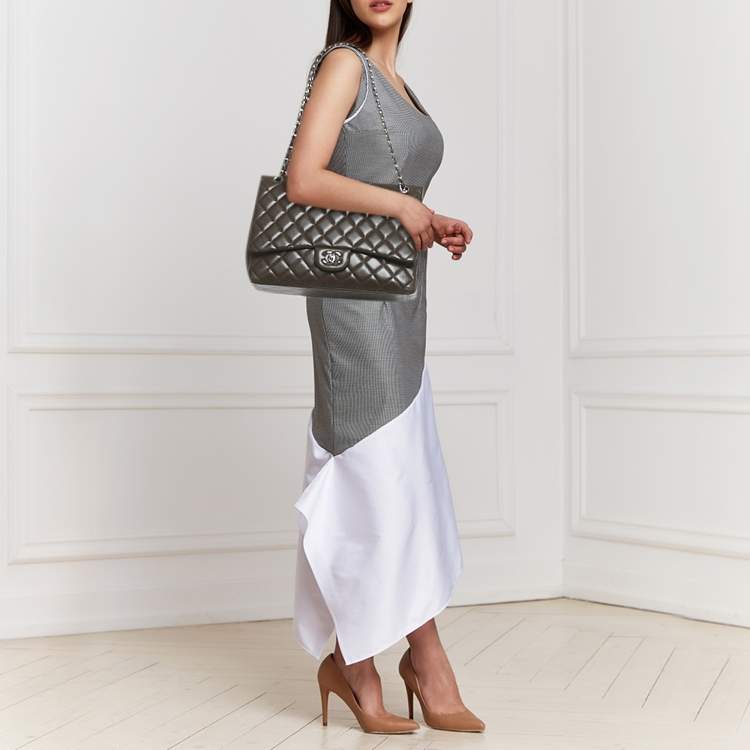 Pre Owned Chanel Dark Brown Quilted Caviar Leather Maxi Classic Single Flap Bag